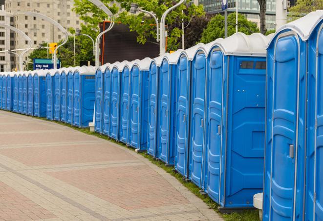 a row of sleek and modern portable restrooms at a special outdoor event in Chesapeake, VA